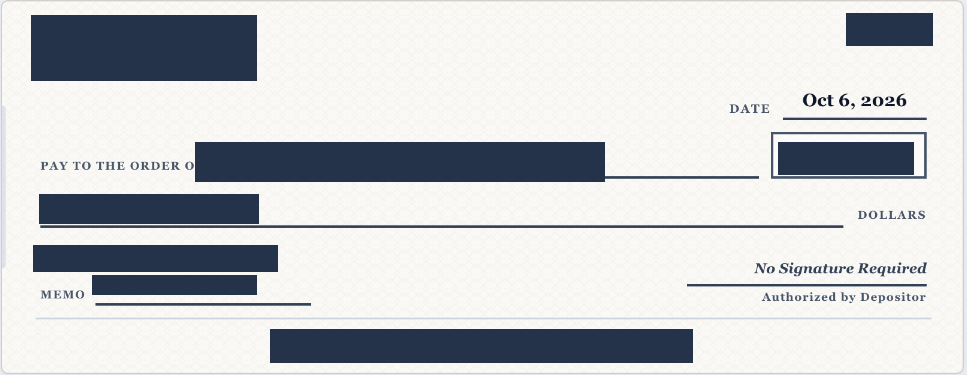 Redacted example of a DraftPay check front; personal, banking and payment identifiers are concealed.